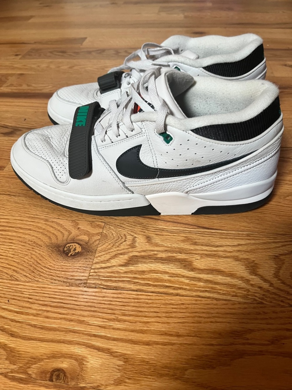 Men’s Nike Air Force White and Black Low-Top Sneakers with Green Accents